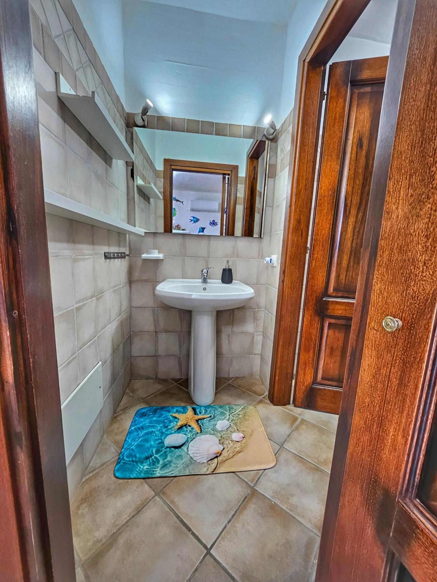 La Perla E Le Conchiglie Tanca Piras Vista Mare Villa Nebida ภายนอก รูปภาพ